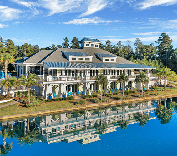 Lakeside clubhouse with water reflection